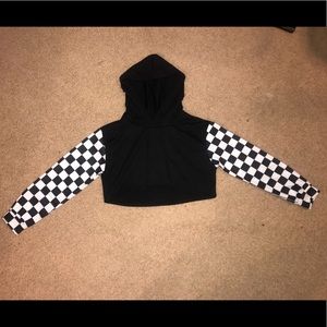Black cropped hoodie with checkered sleeves